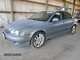 2003 Jaguar X-Type z VIN SAJEB53D93XC91125, wystawiony jako Copart lot #52921965 z przebiegiem 224 469 mil mil oraz Czysty tytuł • Clean title. Historia ofert i sprzedaży dostępna na DreamBid. Obrazek 1.