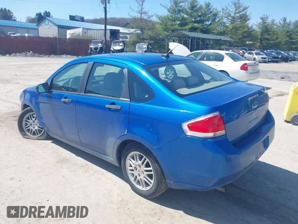2011 Ford Focus SE with VIN 1FAHP3FN2BW111187, listed as a IAAI auction lot 42003148 with 119,083 mi miles. Bid and sale history available at carsss.com. Image 3.