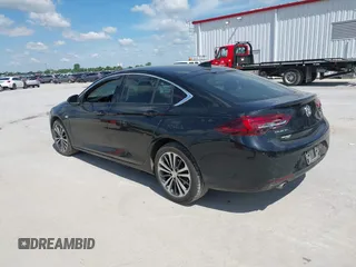 2018 Buick Regal Essence with VIN W04GP6SX5J1120700, listed as a IAAI auction lot 42334588 with 131,926 mi miles and . Bid and sale history available at DreamBid. Image 3.