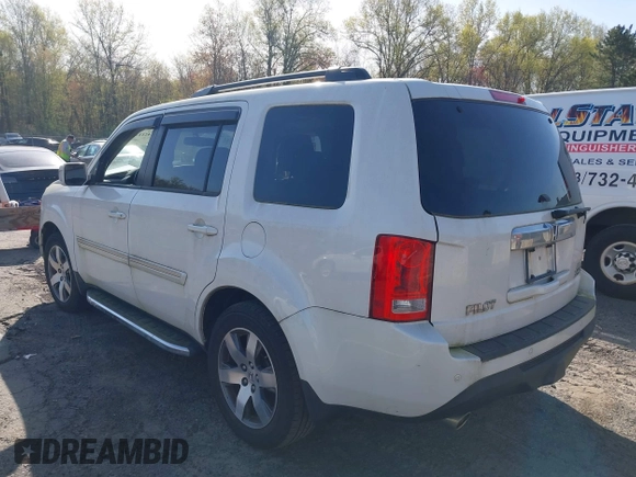 2013 Honda Pilot Touring with VIN 5FNYF4H97DB069979, listed as a IAAI auction lot 42133922 with 276,574 mi miles and . Bid and sale history available at carsss.com. Image 3.