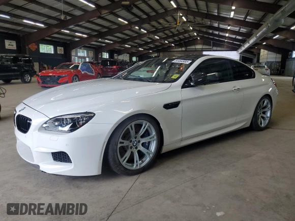 2014 BMW M6 z VIN WBSLX9C58ED160480, wystawiony jako Copart lot #64464985 z przebiegiem 58 514 mil mil oraz Czysty tytuł • Clean title. Historia ofert i sprzedaży dostępna na DreamBid. Obrazek 1.