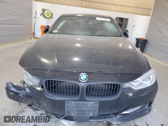 2014 BMW 3 Series 335i xDrive with VIN WBA3B9C59EF588050, listed as a Copart auction lot 54142605 with 118,568 mi miles and Clean Title. Bid and sale history available at carsss.com. Image 5.