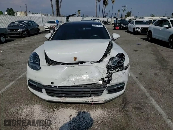 2018 Porsche Panamera 4 E-Hybrid z VIN WP0AE2A75JL130885, wystawiony jako Copart lot #55447835 z przebiegiem 76 932 mil mil oraz Szkoda całkowita • Salvage title. Historia ofert i sprzedaży dostępna na DreamBid. Obrazek 13.