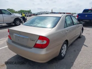 2003 Toyota Camry LE with VIN 4T1BE32K13U243738, listed as a IAAI auction lot 42120647 with Not Provided miles and . Bid and sale history available at DreamBid. Image 4.