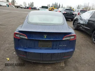 2023 Tesla Model 3 Long Range with VIN 5YJ3E1EB5PF704463, listed as a IAAI auction lot 41916627 with 14,305 mi miles and . Bid and sale history available at DreamBid. Image 16.