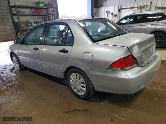 2006 Mitsubishi Lancer ES with VIN JA3AJ26E36U065974, listed as a Copart auction lot 52081885 with 201,728 mi miles and Salvage Title. Bid and sale history available at carsss.com. Image 2.
