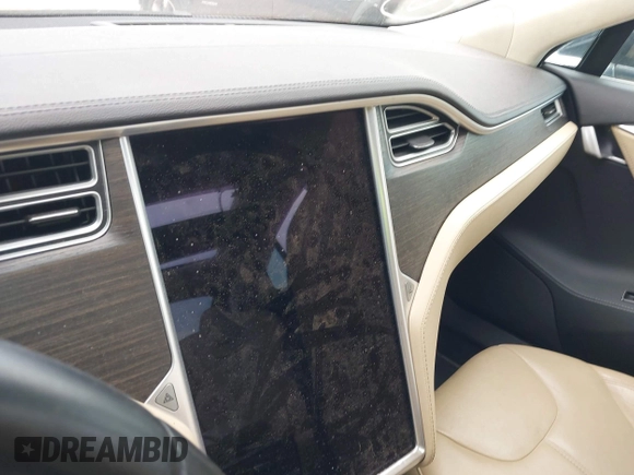 2014 Tesla Model S 60 with VIN 5YJSA1H10EFP34137, listed as a IAAI auction lot 42311565 with Not provided miles and . Bid and sale history available at DreamBid. Image 17.