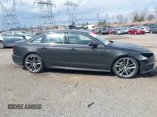 2016 Audi A6 2.0T Premium Plus with VIN WAUGFAFC7GN095669, listed as a IAAI auction lot 41894313 with 84,725 mi miles. Bid and sale history available at carsss.com. Image 14.