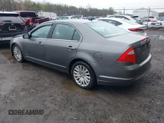 2012 Ford Fusion Hybrid with VIN 3FADP0L34CR215667, listed as a IAAI auction lot 41957936 with 158,914 mi miles and . Bid and sale history available at DreamBid. Image 3.