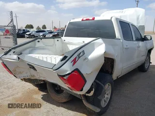 2018 Chevrolet Silverado 1500 LT with VIN 3GCUKREC9JG316576, listed as a IAAI auction lot 41830992 with 153,467 mi miles. Bid and sale history available at carsss.com. Image 4.