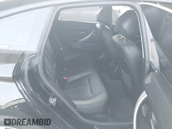 2015 BMW 4 Series 428i with VIN WBA4A9C52FGL85228, listed as a IAAI auction lot 41228043 with 152,729 mi miles and . Bid and sale history available at DreamBid. Image 8.