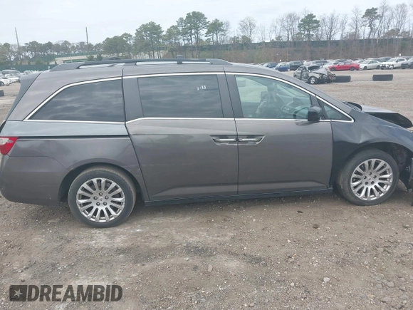 2011 Honda Odyssey EX with VIN 5FNRL5H49BB082706, listed as a IAAI auction lot 42080414 with 228,176 mi miles and . Bid and sale history available at carsss.com. Image 13.