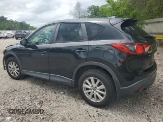 2016 Mazda CX-5 Touring with VIN JM3KE2CY9G0661308, listed as a Copart auction lot 51853485 with 131,595 mi miles and Salvage Title. Bid and sale history available at carsss.com. Image 2.