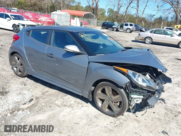 2015 Hyundai Veloster Turbo with VIN KMHTC6AE8FU229198, listed as a IAAI auction lot 41596345 with 74,943 mi miles. Bid and sale history available at carsss.com. Image 1.