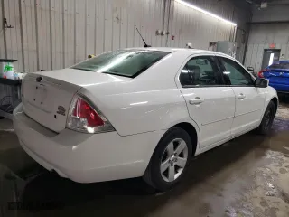 2008 Ford Fusion SE with VIN 3FAHP07128R211568, listed as a Copart auction lot 74850334 with 153,710 mi miles and Salvage Title. Bid and sale history available at carsss.com. Image 3.