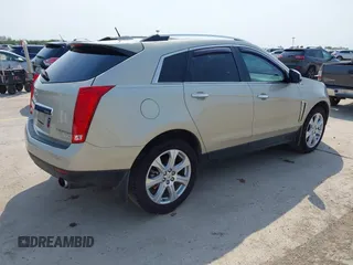 2015 Cadillac SRX Premium Collection with VIN 3GYFNDE38FS561936, listed as a IAAI auction lot 42266801 with 64,820 mi miles and . Bid and sale history available at DreamBid. Image 4.
