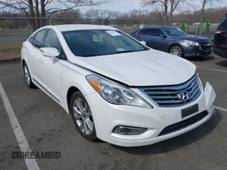 2013 Hyundai Azera with VIN KMHFG4JG7DA247682, listed as a IAAI auction lot 41843611 with 63,009 mi miles. Bid and sale history available at carsss.com. Image 1.