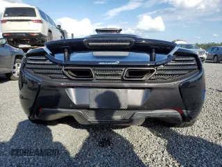 2015 McLaren 650S z VIN SBM11FAA3FW004388, wystawiony jako Copart lot #74802864 z przebiegiem Nie podano mil oraz Szkody całkowita. Historia ofert i sprzedaży dostępna na DreamBid. Obrazek 6.