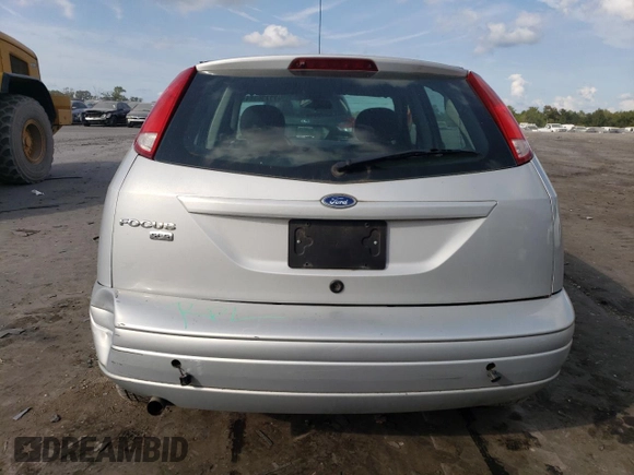 2007 Ford Focus S with VIN 1FAHP37N67W268162, listed as a Copart auction lot 71736384 with 69,391 mi miles and Salvage Title. Bid and sale history available at DreamBid. Image 6.