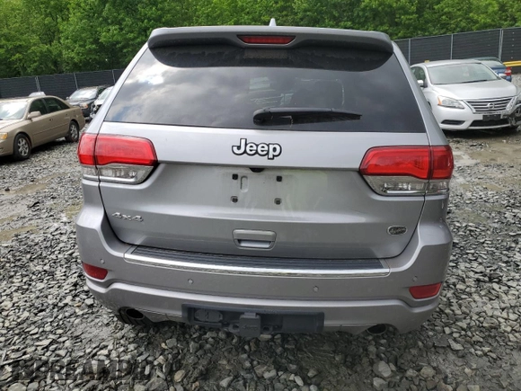 2018 Jeep Grand Cherokee Overland z VIN 1C4RJFCTXJC108624, wystawiony jako Copart lot #53738094 z przebiegiem 83 040 mil mil oraz . Historia ofert i sprzedaży dostępna na DreamBid. Obrazek 6.