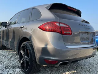 2011 Porsche Cayenne S with VIN WP1AB2A22BLA47332, listed as a Copart auction lot 65087385 with 112,033 mi miles and Salvage title. Bid and sale history available at DreamBid. Image 3.