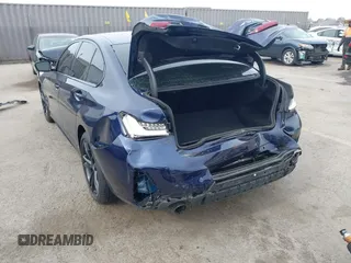 2024 BMW 3 Series 330e with VIN 3MW39FF05R8E83398, listed as a IAAI auction lot 41352962 with 12,406 mi miles. Bid and sale history available at carsss.com. Image 6.
