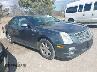 2008 Cadillac STS AWD w/1SB with VIN 1G6DD67V180140356, listed as a IAAI auction lot 41902801 with 141,283 mi miles. Bid and sale history available at carsss.com. Image 1.