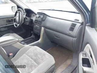 2005 Honda Pilot EX with VIN 2HKYF18465H565524, listed as a IAAI auction lot 41927812 with 218,637 mi miles. Bid and sale history available at carsss.com. Image 5.