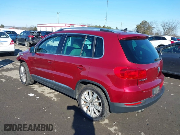 2012 Volkswagen Tiguan S with VIN WVGBV7AX2CW078629, listed as a IAAI auction lot 41332445 with 94,239 mi miles and . Bid and sale history available at DreamBid. Image 3.