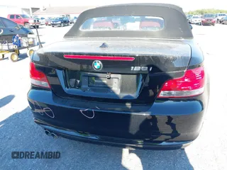 2011 BMW 1 Series 128i with VIN WBAUL7C55BVM81049, listed as a IAAI auction lot 41892811 with 50,659 mi miles and . Bid and sale history available at carsss.com. Image 17.