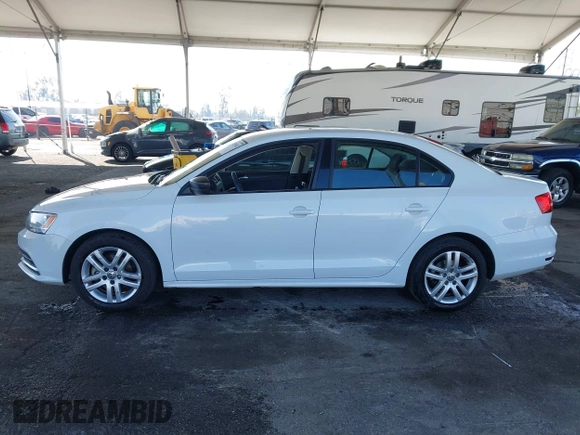 2015 Volkswagen Jetta Sedan 2.0L S with VIN 3VW2K7AJ3FM253125, listed as a IAAI auction lot 41535632 with 103,953 mi miles. Bid and sale history available at carsss.com. Image 14.
