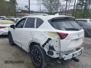 2016 Mazda CX-5 Grand Touring with VIN JM3KE2DY6G0622030, listed as a IAAI auction lot 41943466 with 110,283 mi miles. Bid and sale history available at carsss.com. Image 14.