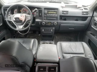 2014 Honda Ridgeline RTL с VIN 5FPYK1F50EB008282, выставлен на аукционе Copart как лот 51748265 с пробегом 124 609 миль миль и Чистый • Clean title. История ставок и продаж доступна на DreamBid. Изображение 8.
