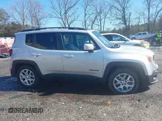 2015 Jeep Renegade Latitude with VIN ZACCJABT1FPB80079, listed as a IAAI auction lot 41768086 with 125,467 mi miles. Bid and sale history available at carsss.com. Image 13.