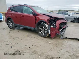 2018 Toyota RAV4 XLE with VIN 2T3WFREV7JW429781, listed as a Copart auction lot 51759485 with 72,792 mi miles and Salvage Title. Bid and sale history available at DreamBid. Image 4.