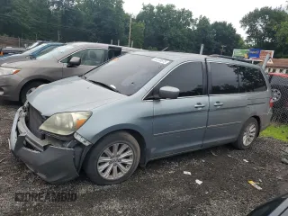 2016 Honda Odyssey Touring with VIN 5FNRL38865B105158, listed as a Copart auction lot 64376875 with 171,501 mi miles and Salvage title. Bid and sale history available at DreamBid. Image 1.