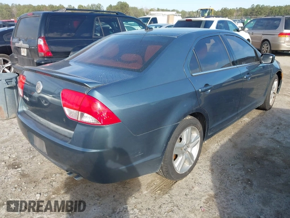 2011 Mercury Milan with VIN 3MEHM0HA2BR601822, listed as a IAAI auction lot 41282889 with 214,389 mi miles. Bid and sale history available at carsss.com. Image 4.