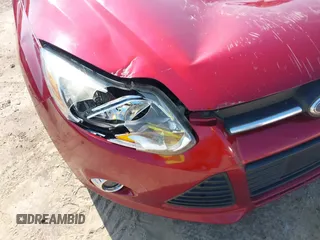 2013 Ford Focus SE with VIN 1FADP3F23DL383806, listed as a IAAI auction lot 42737374 with 136,067 mi miles and . Bid and sale history available at DreamBid. Image 14.