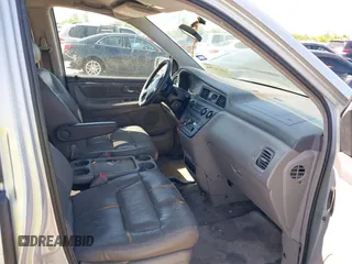 2002 Honda Odyssey EX-L z VIN 5FNRL18062B011890, wystawiony jako IAAI lot #41972294 z przebiegiem 245 889 mil mil oraz . Historia ofert i sprzedaży dostępna na DreamBid. Obrazek 5.