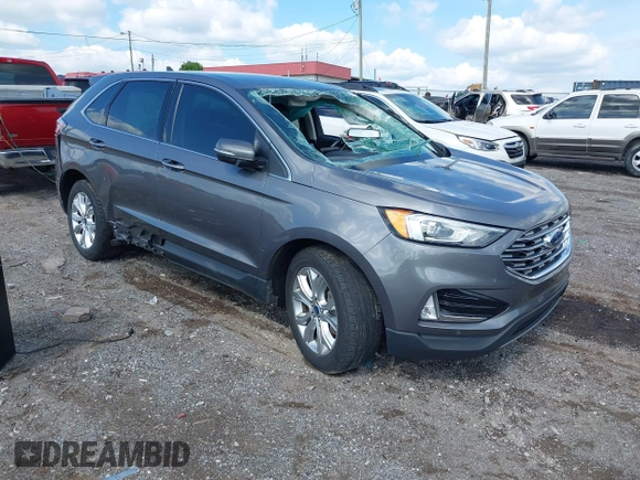 2021 Ford Edge Titanium z VIN 2FMPK3K9XMBA21766, wystawiony jako IAAI lot #42187940 z przebiegiem 79 732 mil mil oraz . Historia ofert i sprzedaży dostępna na DreamBid. Obrazek 1.