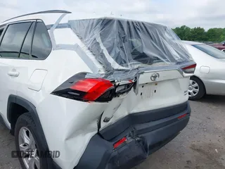 2019 Toyota RAV4 XLE with VIN JTMP1RFV6KD515454, listed as a IAAI auction lot 42618019 with 85,868 mi miles and . Bid and sale history available at DreamBid. Image 6.