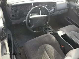 1997 Dodge Dakota z VIN 1B7GG23Y8VS161313, wystawiony jako Copart lot #77646454 z przebiegiem 286 443 mil mil oraz Szkoda całkowita • Salvage title. Historia ofert i sprzedaży dostępna na DreamBid. Obrazek 8.