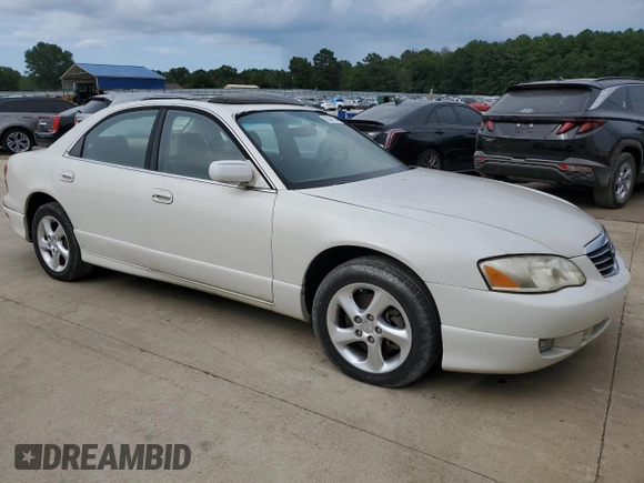 2001 Mazda Millenia z VIN JM1TA221911717066, wystawiony jako Copart lot #63341244 z przebiegiem 234 263 mil mil oraz Szkoda całkowita • Salvage title. Historia ofert i sprzedaży dostępna na DreamBid. Obrazek 4.