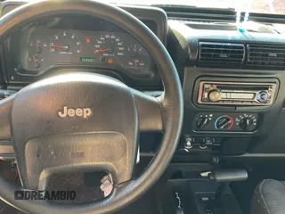 2005 Jeep Wrangler X with VIN 1J4FA39S55P348575, listed as a Copart auction lot 70313644 with 152,607 mi miles and Clean Title. Bid and sale history available at carsss.com. Image 9.