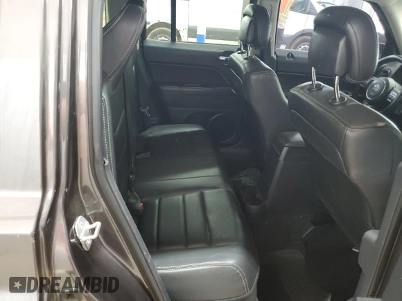 2014 Jeep Patriot High Altitude z VIN 1C4NJPFA4ED813336, wystawiony jako Copart lot #54747055 z przebiegiem 144 000 mil mil oraz Szkoda całkowita • Salvage title. Historia ofert i sprzedaży dostępna na DreamBid. Obrazek 11.