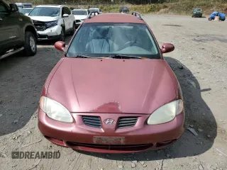 1999 Hyundai Elantra z VIN KMHJW35F0XU129498, wystawiony jako Copart lot #74481134 z przebiegiem 72 123 mil mil oraz Czysty tytuł • Clean title. Historia ofert i sprzedaży dostępna na DreamBid. Obrazek 5.