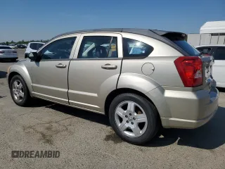 2009 Dodge Caliber SXT z VIN 1B3HB48A19D199410, wystawiony jako Copart lot #55133965 z przebiegiem 141 658 mil mil oraz Szkoda całkowita • Salvage title. Historia ofert i sprzedaży dostępna na DreamBid. Obrazek 2.