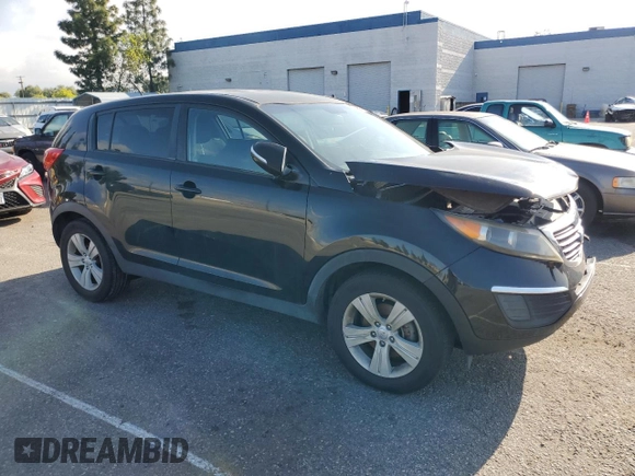 2012 Kia Sportage LX с VIN KNDPB3A21C7345995, выставлен на аукционе Copart как лот 51629505 с пробегом 129 255 миль миль и Списание • Salvage title. История ставок и продаж доступна на DreamBid. Изображение 4.