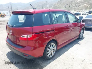 2015 Mazda 5 Grand Touring with VIN JM1CW2DL6F0190312, listed as a IAAI auction lot 42433782 with 79,140 mi miles and . Bid and sale history available at DreamBid. Image 4.