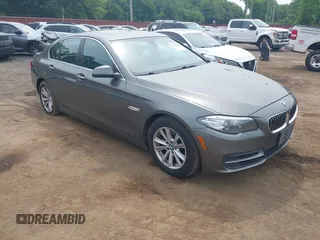 2014 BMW 5 Series 528i xDrive with VIN WBA5A7C51ED615091, listed as a IAAI auction lot 42469450 with 94,862 mi miles and . Bid and sale history available at DreamBid. Image 1.